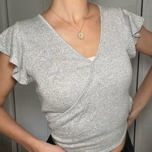 Cropped V neck with ruffled short sleeves